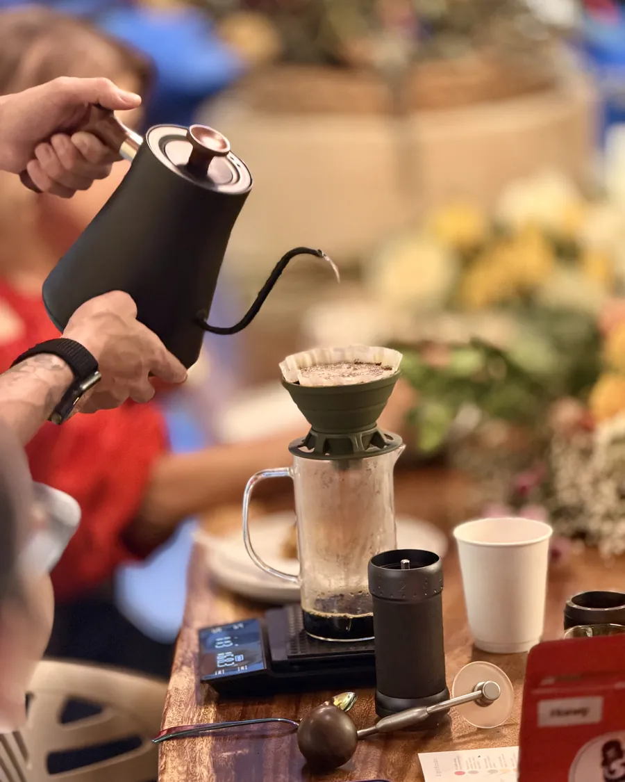 Coffee in between — While the flowers wait, the coffee gets brewed. The two go together.